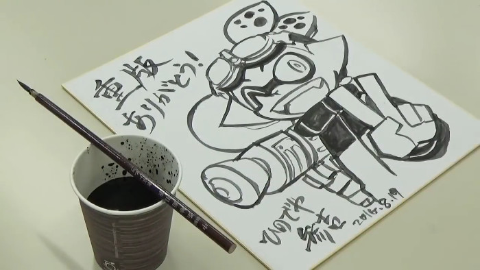 イカ墨で主人公のゴーグルくんを描いている様子が動画